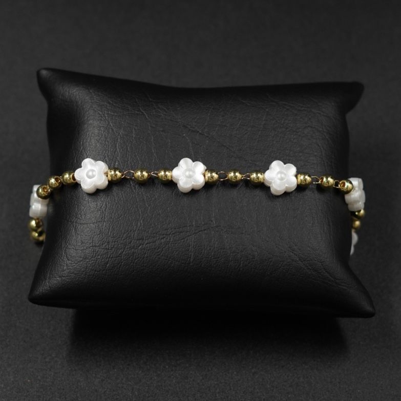 TOBILLERA FLORES BLANCAS Y DORADO ACERO